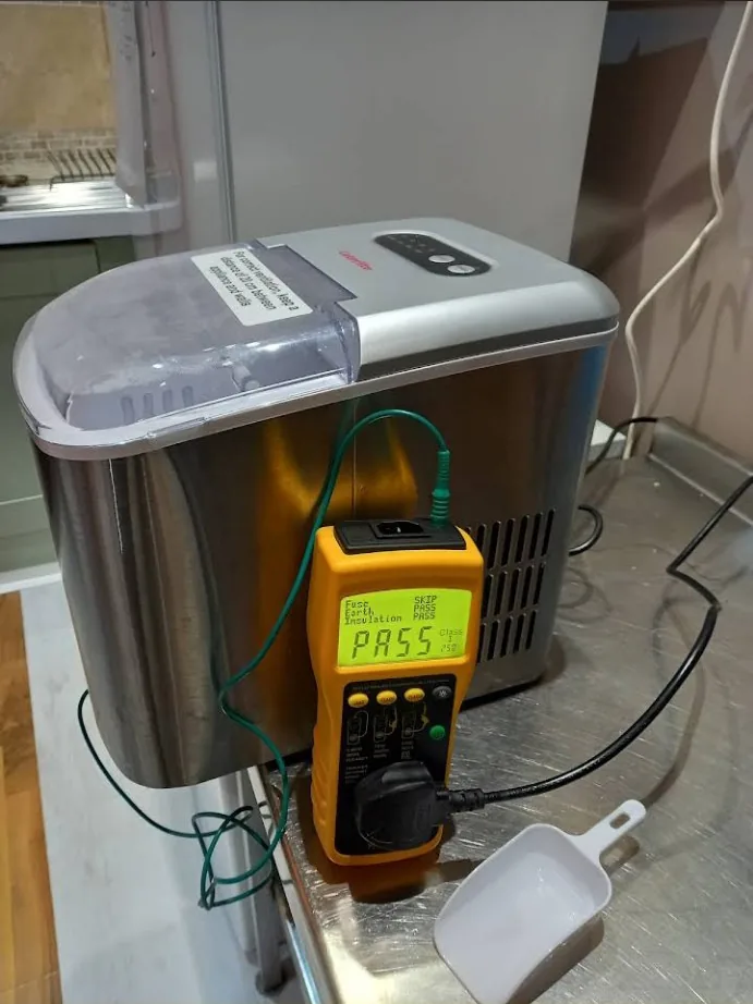 Commercial ice machine being PAT tested